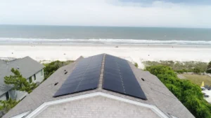 beachfront-house-with-rooftop-solar-panels-and-ocean-view